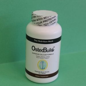 OsteoBuild calcium supplement bottle on green background.