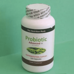Probiotic supplement bottle on green background.