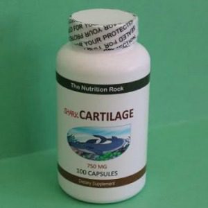 Bottle of dietary supplement capsules.