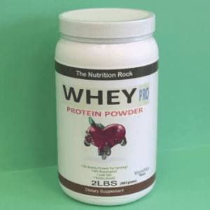 Whey protein powder container on green background.