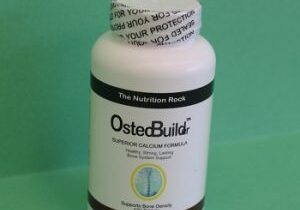 OsteoBuild calcium supplement bottle on green background.
